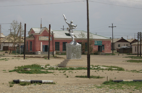 A monument to Jugderdemidiyn Gurragchaa, the first Mongolian cosmonaut, in the center of Choir, a small town in Govisumber Province, Mongolia. Photo taken August 7th, 2009. (Wikimedia user Vidor).